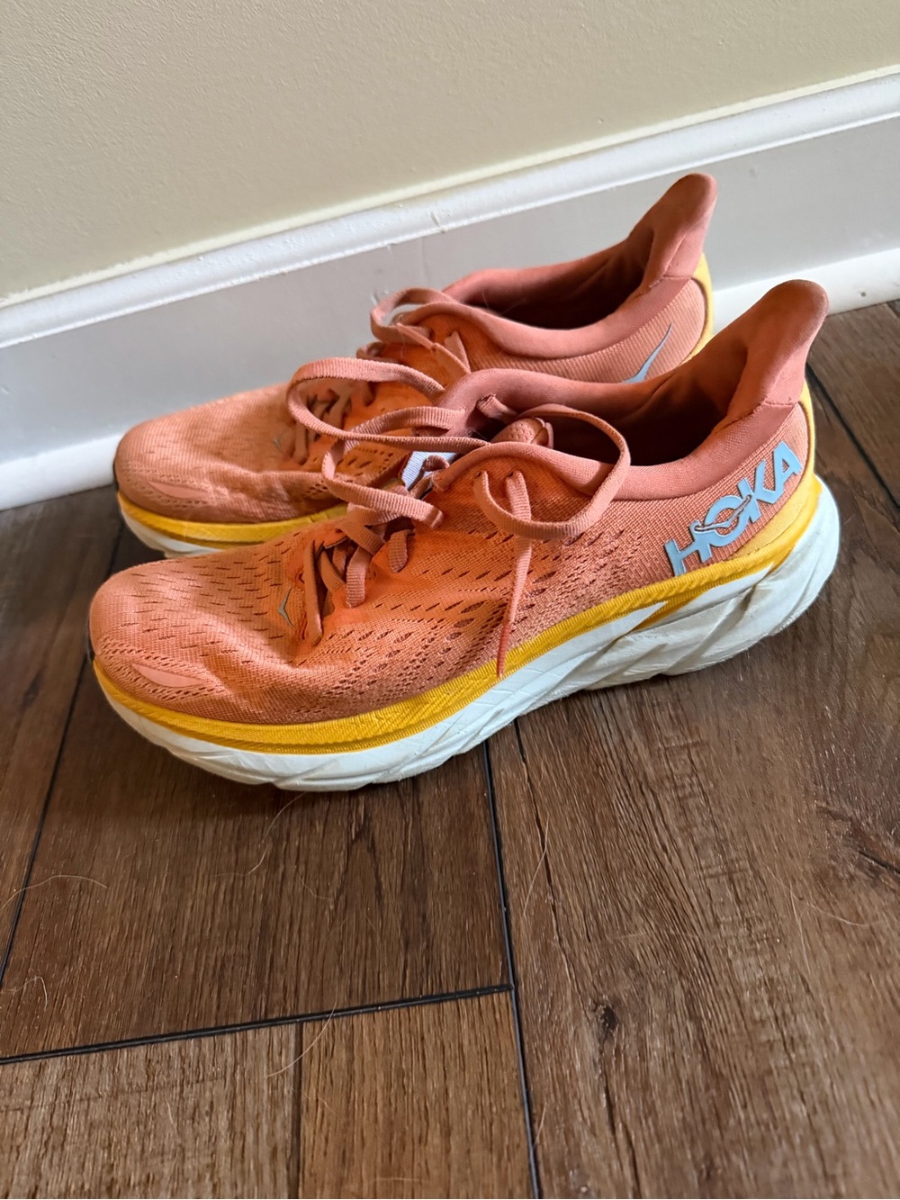 Hoka Women's Coral-Orange Running Shoes with Yellow Trim